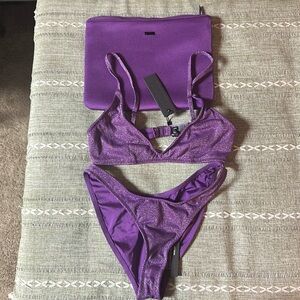 Triangl Swimwear Shimmering Purple Swimset with matching bag.